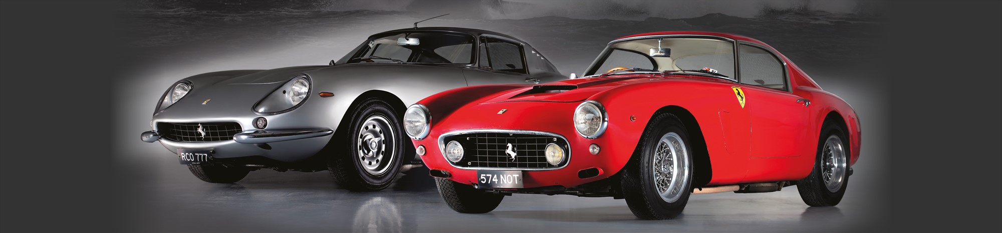 Classic Silver Ferrari and Classic Red Ferrari