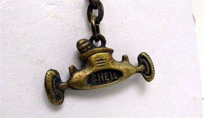 Lot 154 - A 'Shell Oils' Single-Seater Promotional Key Ring