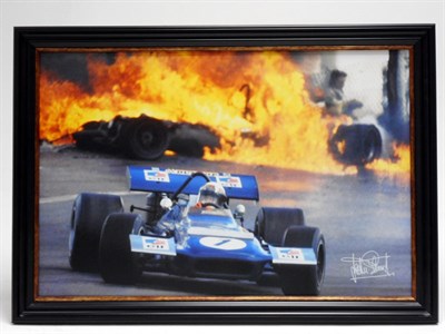 Lot 264 - Jackie Stewart at the 1970 Spanish Grand Prix (Signed)