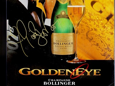 Lot 9 - Pierce Brosnan as James Bond ‘Goldeneye’ Bollinger Advertising Showcard (Signed)