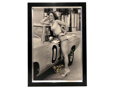 Lot 11 - Catherine Bach as ‘Daisy Duke’ Exhibition Board (Signed)