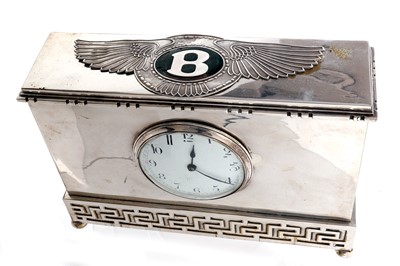 Lot 100 - A Large Silver-Plated Mantel Clock