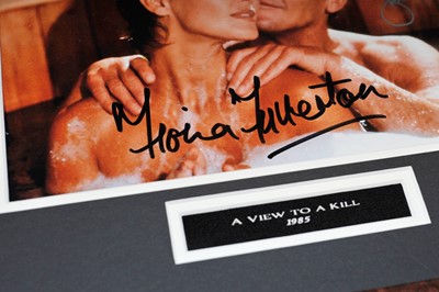 Lot 358 - Roger Moore and Fiona Fullerton - James Bond 'A View to a Kill' Signed Photograph