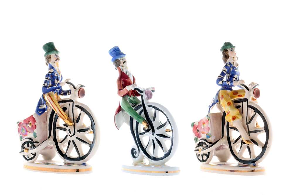 Lot 459 - Three Penny Farthing Ceramic Figurines