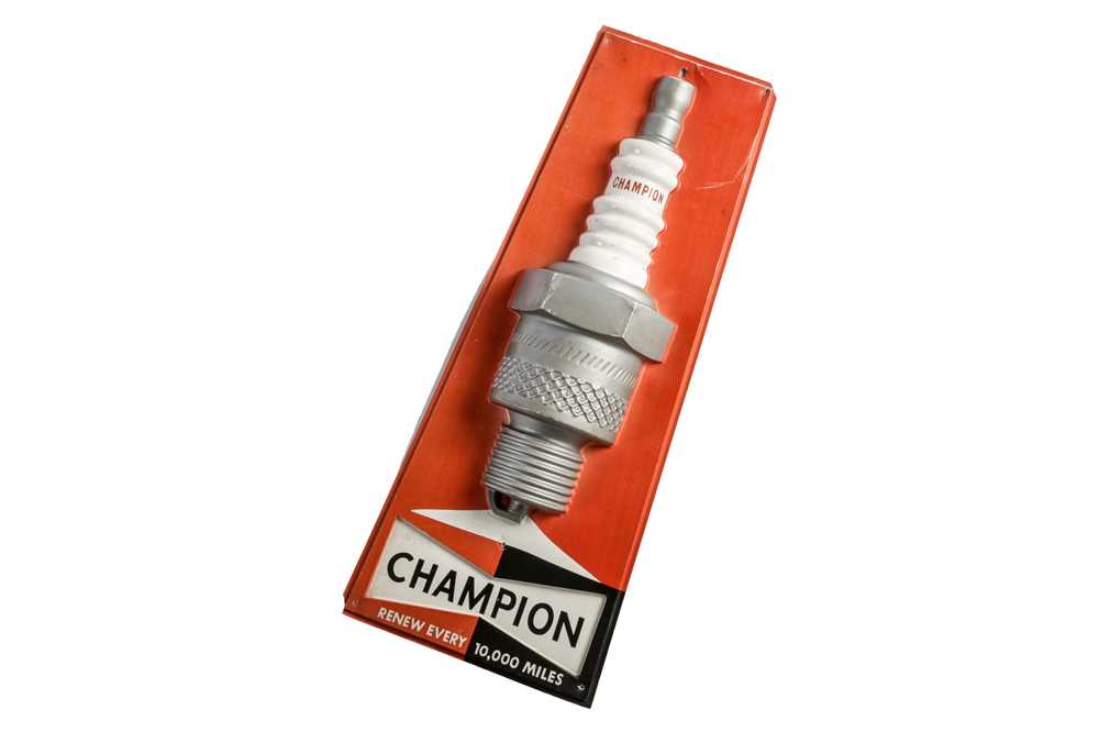Lot 103 - A Champion Spark Plugs Garage Sign, c1970s