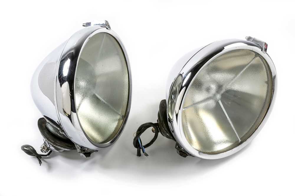 Lot 581 - A Pair of Lucas P100L Headlamps