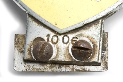 Lot 561 - Two Car Badges