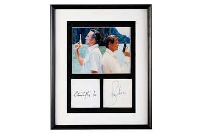 Lot 75 - Roger Moore and Christopher Lee - James Bond - 'The Man with the Golden Gun' Autograph Presentation