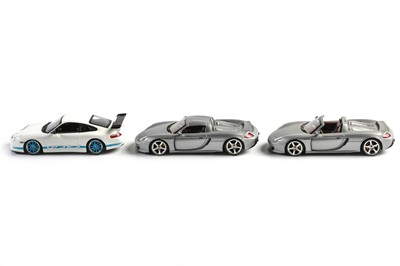 Lot 673 - Two Boxed Official 1:43 Scale Porsche Models by Minichamps/Paul’s Model Art