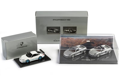 Lot 673 - Two Boxed Official 1:43 Scale Porsche Models by Minichamps/Paul’s Model Art