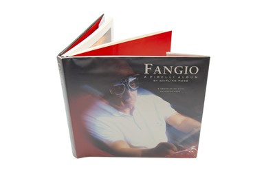 Lot 78 - 'Fangio - A Pirelli Album' - Signed by Juan-Manuel Fangio and Stirling Moss