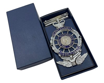 Lot 635 - A Boxed New Old Stock Royal Automobile Club Centenary Badge