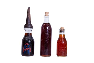 Lot 293 - Three Glass Oil Bottles