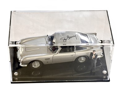 Lot 135 - Sean Connery Signed 1:18 Aston Martin DB5 Model and Figurine Presentation