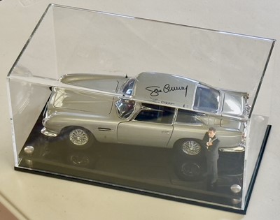 Lot 135 - Sean Connery Signed 1:18 Aston Martin DB5 Model and Figurine Presentation