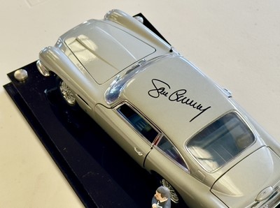 Lot 135 - Sean Connery Signed 1:18 Aston Martin DB5 Model and Figurine Presentation