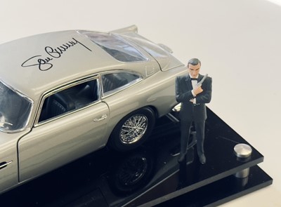 Lot 135 - Sean Connery Signed 1:18 Aston Martin DB5 Model and Figurine Presentation