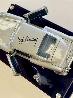 Lot 135 - Sean Connery Signed 1:18 Aston Martin DB5 Model and Figurine Presentation
