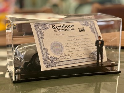 Lot 135 - Sean Connery Signed 1:18 Aston Martin DB5 Model and Figurine Presentation