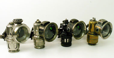Lot 406 - Four Carbide Motorcycle Lights