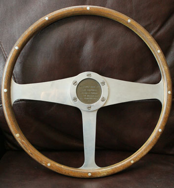 Lot 702 - A Wooden Rimmed Steering Wheel.