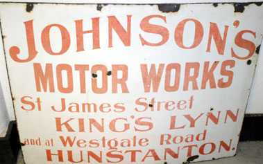 Lot 821 - JohnsonS Motor Works Enamel Garage Sign