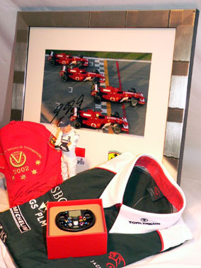 Lot 619 - Ferrari Times Four Schumacher Signed Photograph