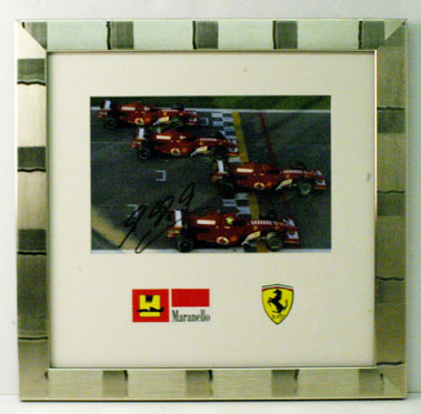 Lot 601 - Ferrari Times Four Schumacher Signed Photograph