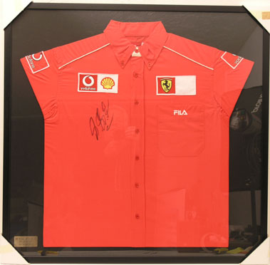 Lot 623 - Michael Schumacher Signed Ferrari Polo Shirt