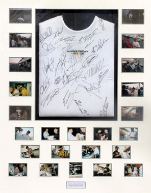 Lot 609 - Large Signed Suzuka F1 T-Shirt Presentation