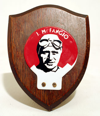Lot 214 - J.M. Fangio Enamel Motorcar Badge