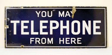 Lot 704 - 'You May Telephone From Here' Enamel Sign