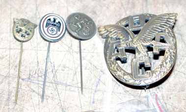 Lot 702 - Four Nazi German Pin Badges