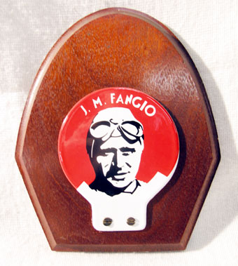 Lot 320 - Fangio Enamel Car Badge on Shield