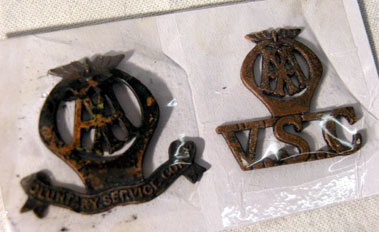 Lot 203 - Two AA Voluntary Service Corps Badges