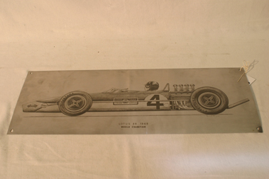 Lot 813 - Lotus 49 'Gold Leaf' Stainless Steel Sign