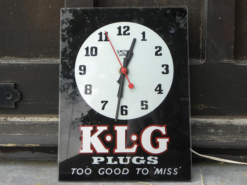 Lot 76 - A KLG Plugs Wall Clock