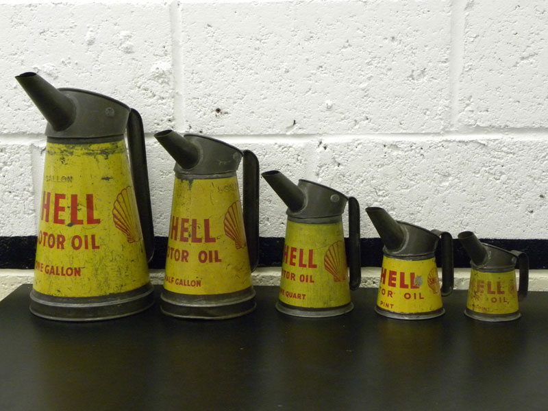 Lot 98 - Five Early Shell Oil Pourers