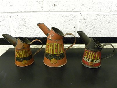 Lot 102 - Three Shell Pourers