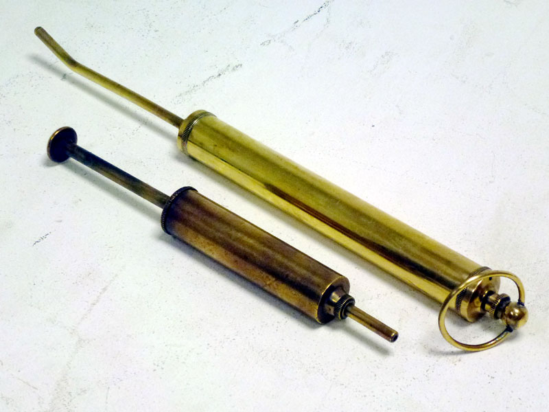 Lot 72 - Two Brass Oil Syringes