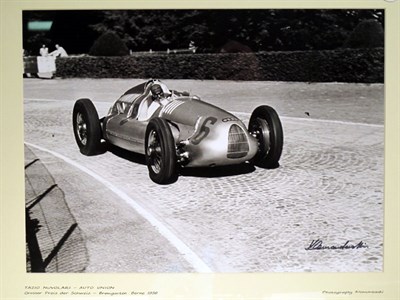 Lot 367 - 'Tazio Nuvolari in the Auto Union' by Louis Klemantaski