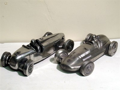 Lot 373 - Two Large Pewter Models