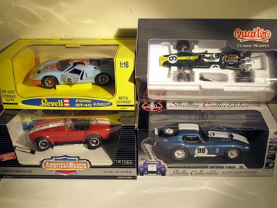 Lot 395 - Four Boxed Racing Car Models