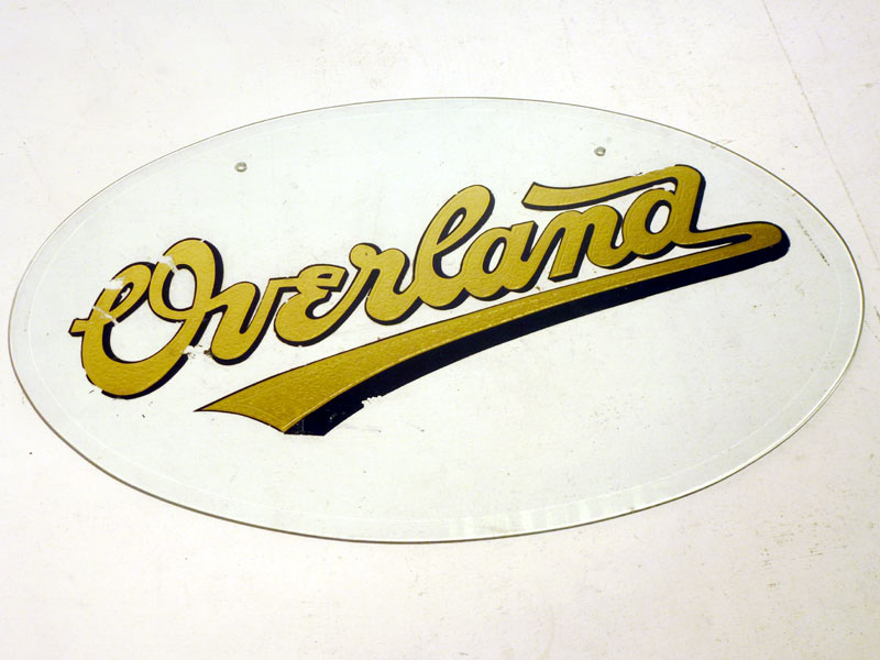 Lot 5 - Overland Cars (Willys) Glass Advertising Sign