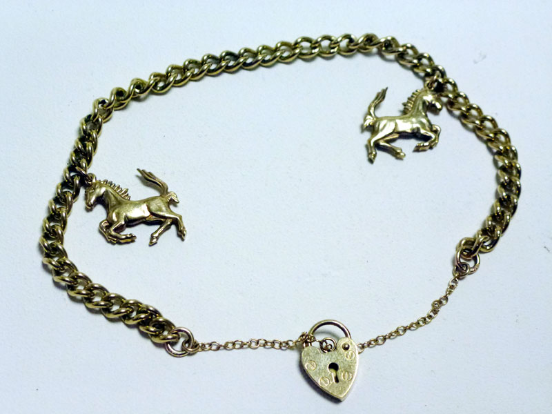Lot 24 - A Solid Gold Ferrari 'Prancing Horse' Charm Bracelet