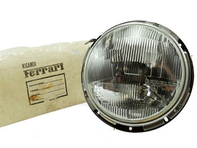 Lot 385 - A Ferrari 275 Headlamp